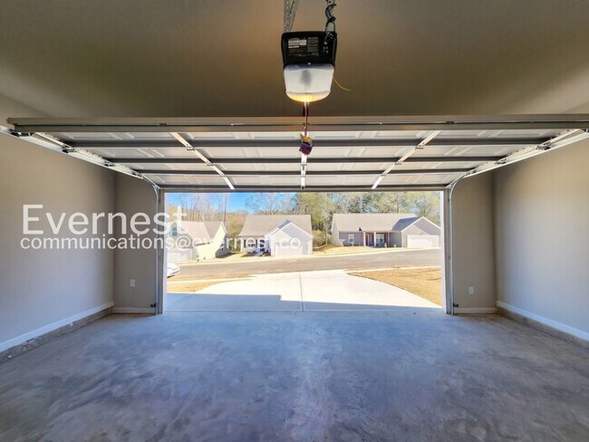 Building Photo - 4-Bedroom Home with Attached Garage / Pet-Friendly / Coming Soon!