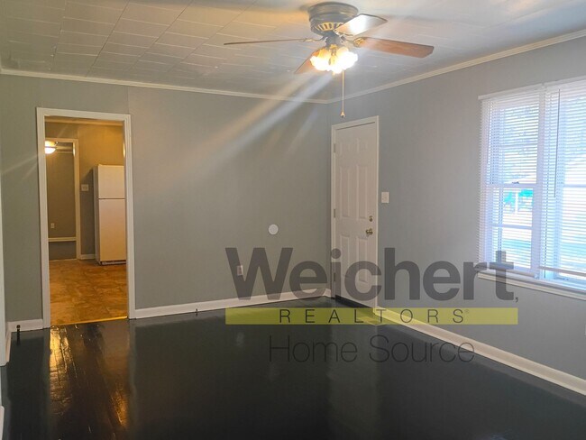 Building Photo - Quality finishes and adaptable design in a desirable location