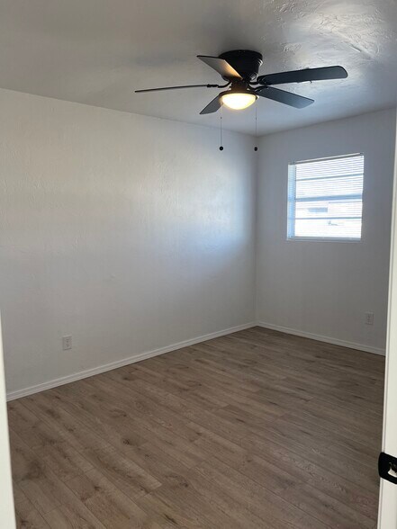 Bedroom #2 with freshly painted walls - 613 S 6th St