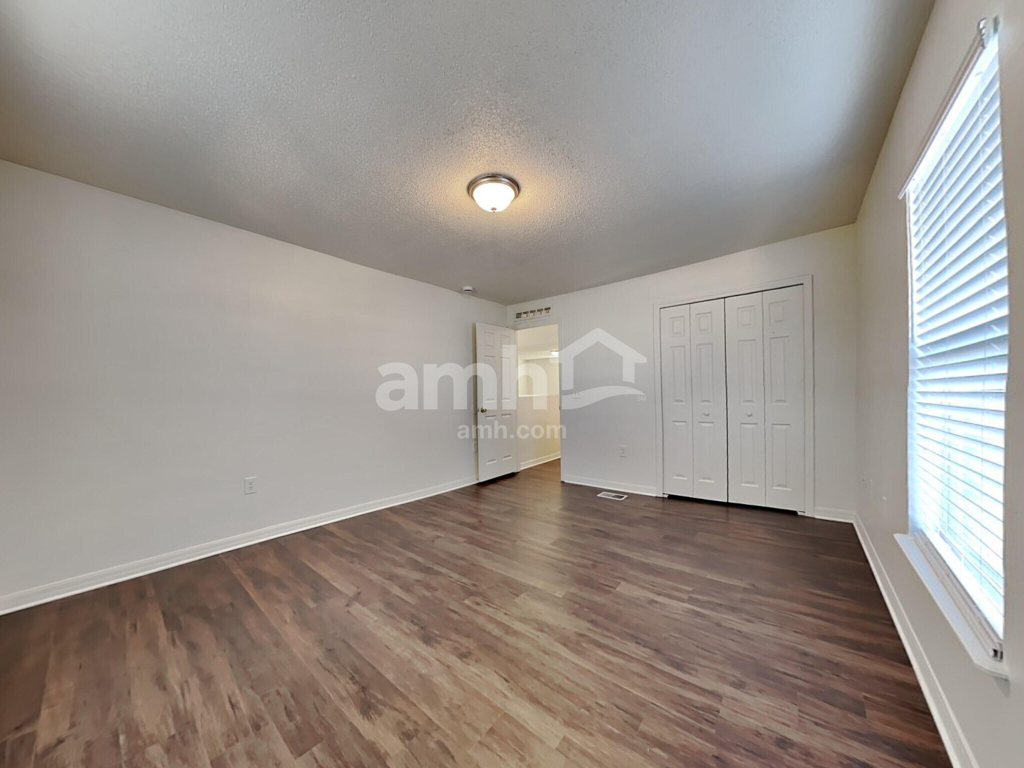 Building Photo - 6686 Gentle Oaks Dr E