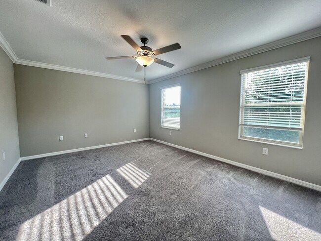 Building Photo - "Charming 3-Bed townhouse in a Gated Community has 2.5 Baths, 1650 Sq Ft  – New Flooring and New ...