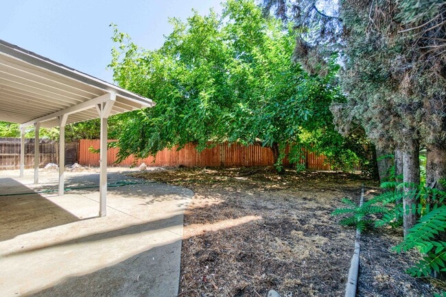 Building Photo - Spacious 2-Bed Duplex with Private Backyar...