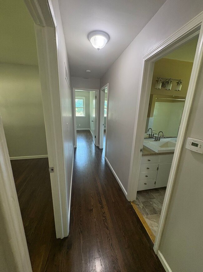 Building Photo - Spacious 4 Bed / 2.5 Bath Home on Nearly 3/4 Acre Lot with Walkout Basement and Multiple Living A...