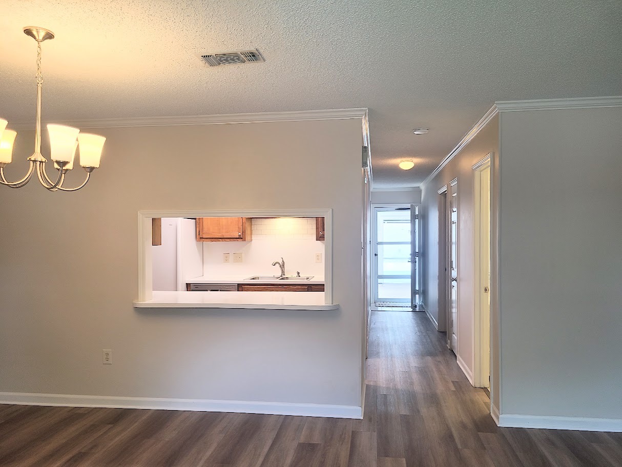Cook while visiting with company in dining room - 12439 Coursey Blvd