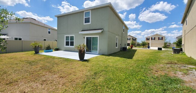 Expanded patio w/ plenty of space for a large outdoor dining set! - 7583 Tuscan Bay Cir