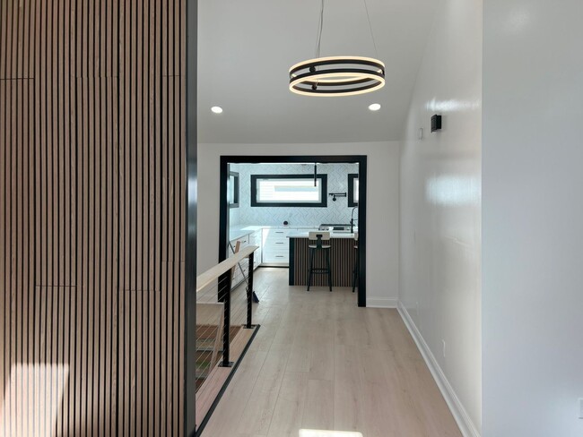 Building Photo - Step into modern luxury right here in Bloo...