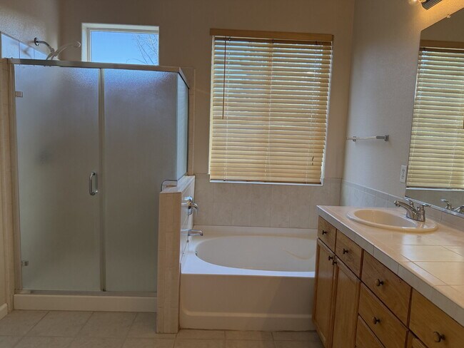 Building Photo - South Reno Home with 4 Bedrooms + 3 Car Garage!
