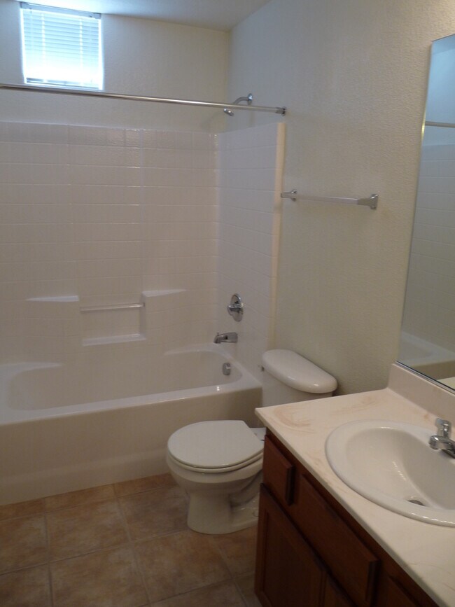 Building Photo - GATED 2 BEDROOM, 2 BATH CONDO IN JASMINE RANCH COMMUNITY