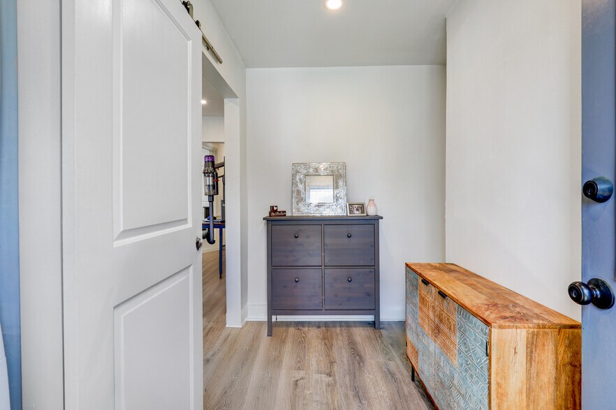 Back door entrance with LVP flooring throughout - 606 Beach Ave