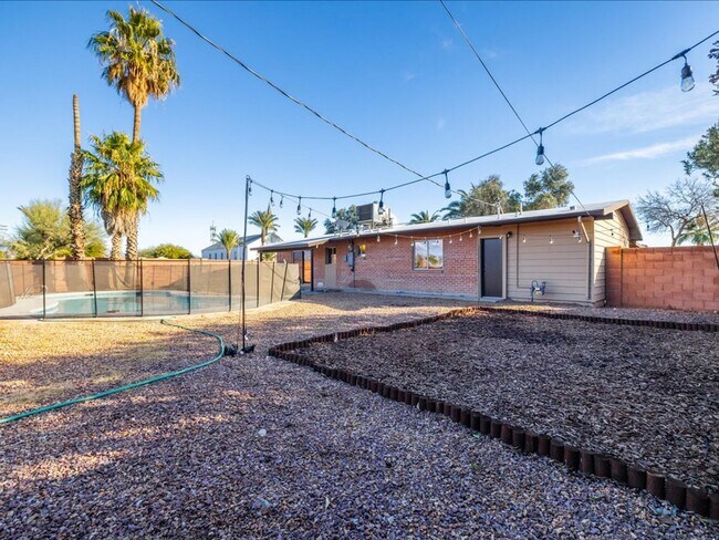 Building Photo - Beautiful 3-Bedroom Home with Private Pool & Security Gate