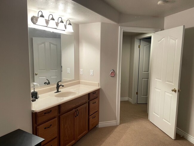 Building Photo - Beautiful home with 3 car garage and oversized covered deck.
