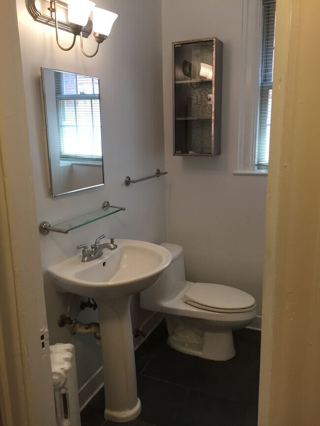 Building Photo - Updated Cathedral Studio with in-unit W/D