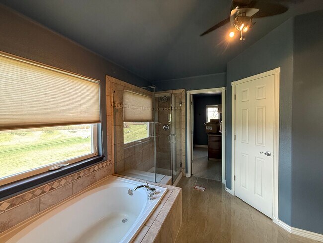 Building Photo - Your Colorado Oasis Awaits! 4 Bed, 3.5 Bath Home with Modern Amenities next to open space