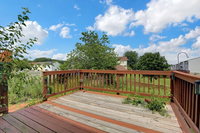Building Photo - Spacious 4-Level Home with Deck, Workshop ...