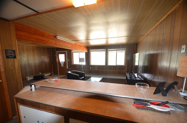 Building Photo - Garden level one bedroom apartment in the hills above BRECK.  Pets OK!  Includes HEAT and electri...