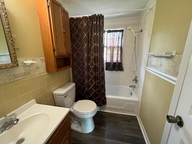Building Photo - Renovated 4 Bedroom 2 Bath Home with 2 Car...