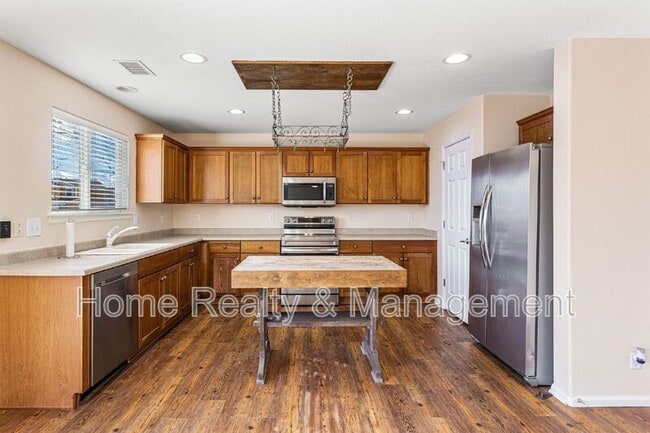 Building Photo - 6380 E 139th Ave