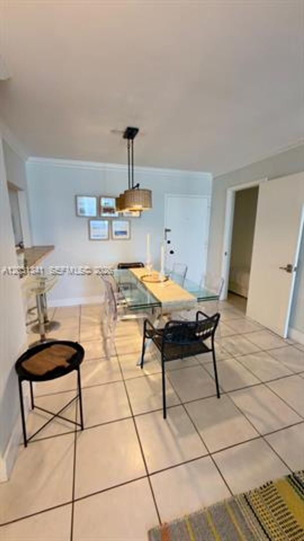 Building Photo - 5555 Collins Ave