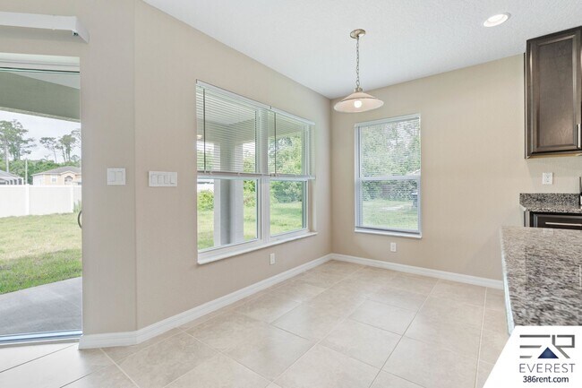 Building Photo - FULLY FENCED 3/2/2 IN DESIRABLE QUAIL HOLLOW