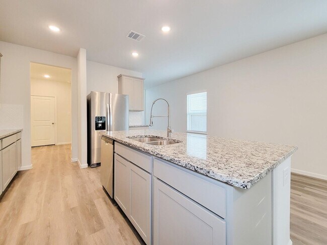 Building Photo - Welcome Home! Your never-lived-in sanctuary awaits your arrival. Have a large household? This 5-b...