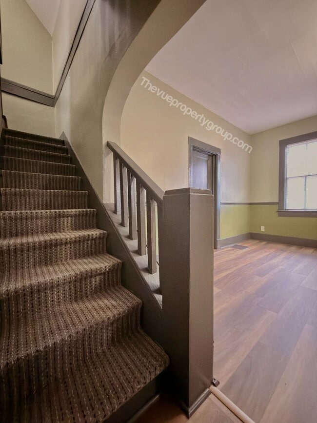 Building Photo - Charming Three-Bedroom with Garage & Fenced Yard