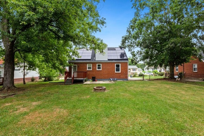 Building Photo - Move-In Ready Cape Cod with 3 Finished Levels & Huge Backyard