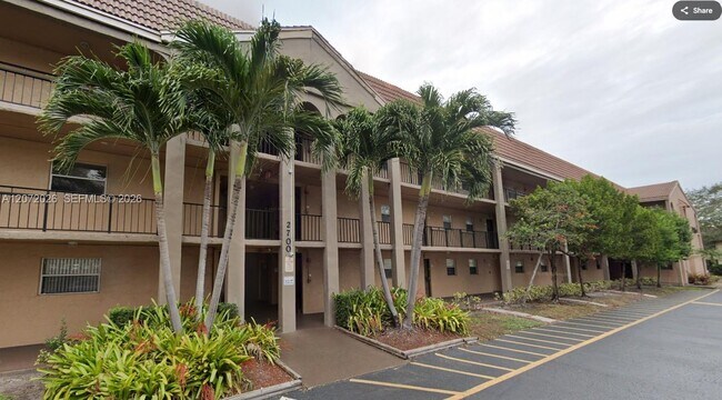 Building Photo - 2700 Coral Springs Dr