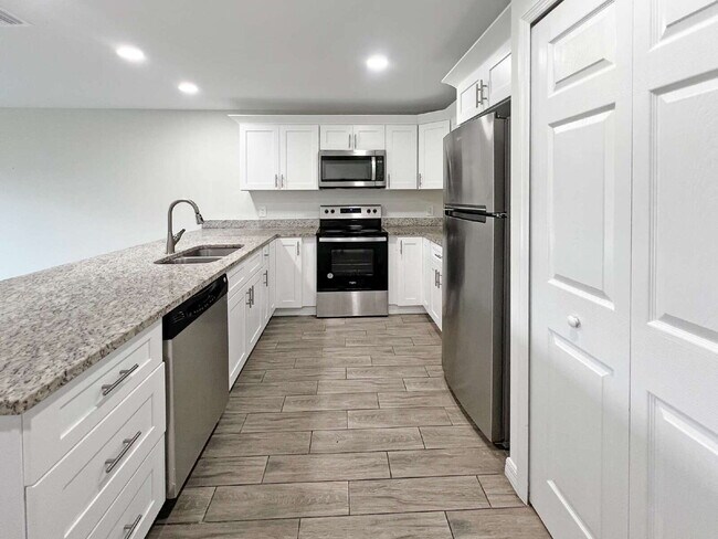 Building Photo - Move-In Special! Half Month FREE – APPLY b...