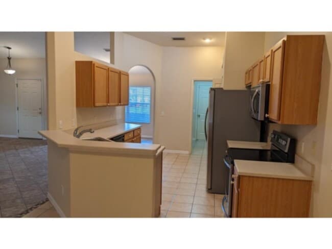 Building Photo - Check this one out!  Open Split Spacious House in Palm Coast, FL!