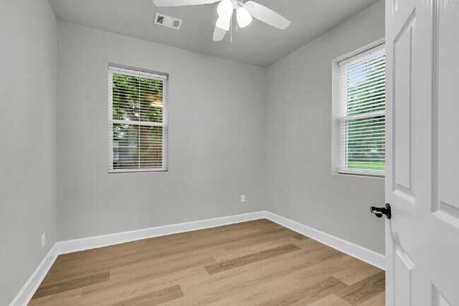Building Photo - Cute all brick ranch on a large corner lot with fenced in yard and 1 car garage