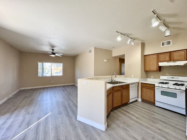 Building Photo - DOWNSTAIRS CONDO | GATED COMMUNITY | CENTENNIAL HILLS | UPDATED 3 BEDROOM