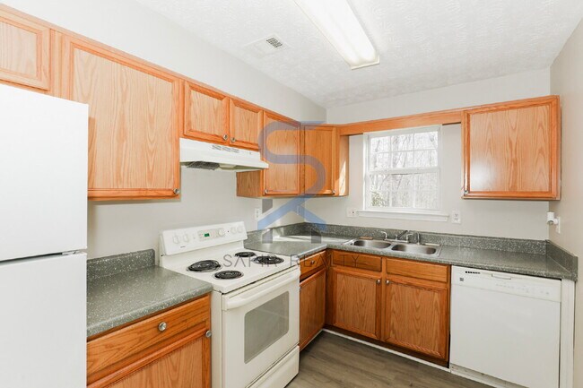 Building Photo - Modern All-Electric Comfort – 2BR/1.5BA at Wellington Chase Court