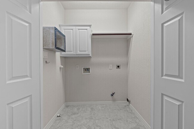 Building Photo - Luxury Townhome with Attached Garage & Outdoor Entertaining Area - $100 off first and second mont!