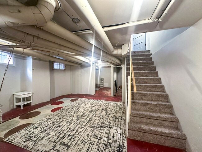 Building Photo - A home where old-world charm meets modern sophistication!