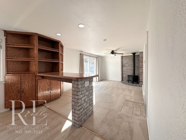 Building Photo - A Warm & Welcoming Rambler in the Heart of Central Kitsap