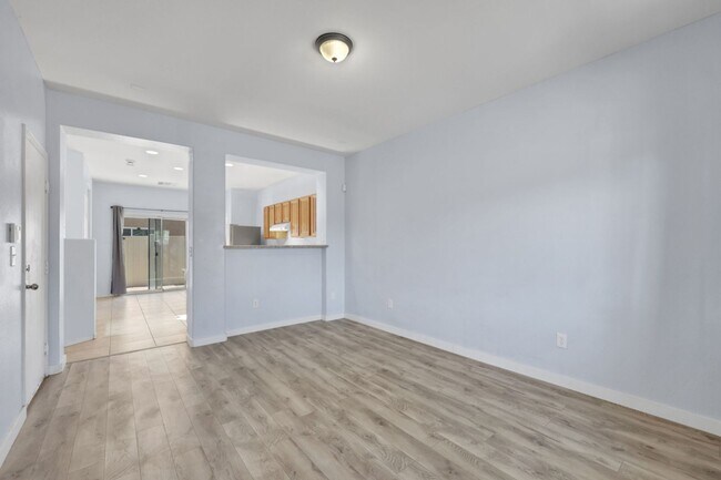 Building Photo - Updated Two-Story 3 bed/2.5 bath Home with Open Kitchen, Attached 1 Car Garage & Modern Flooring ...