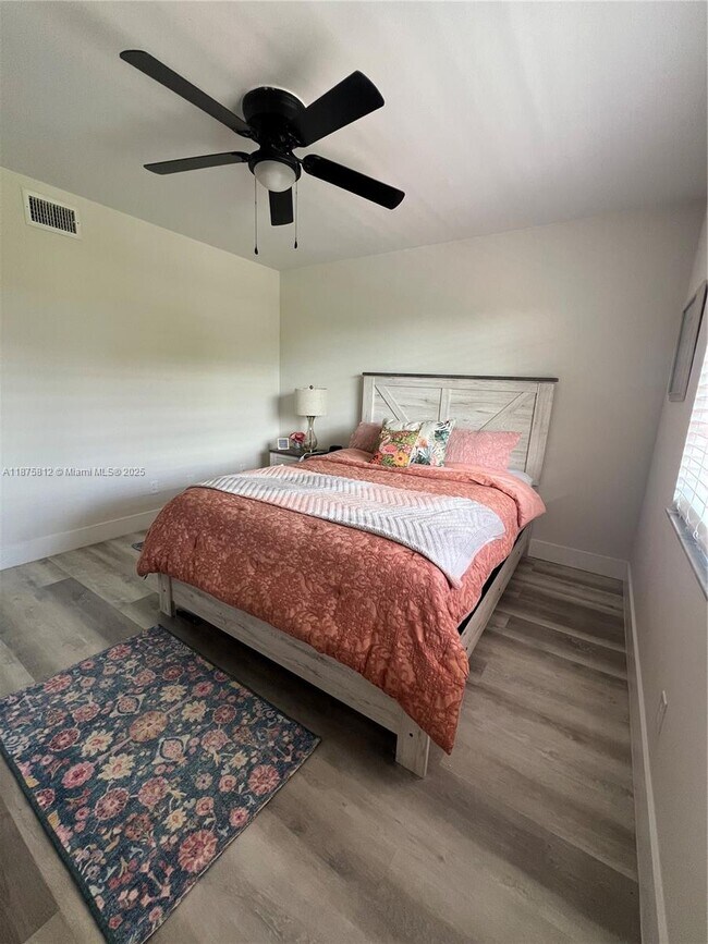 Building Photo - 4950 E Sabal Palm Blvd