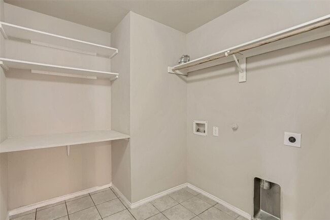 Building Photo - This well-maintained 4 bedroom home is located in a quiet neighborhood that has a community park ...