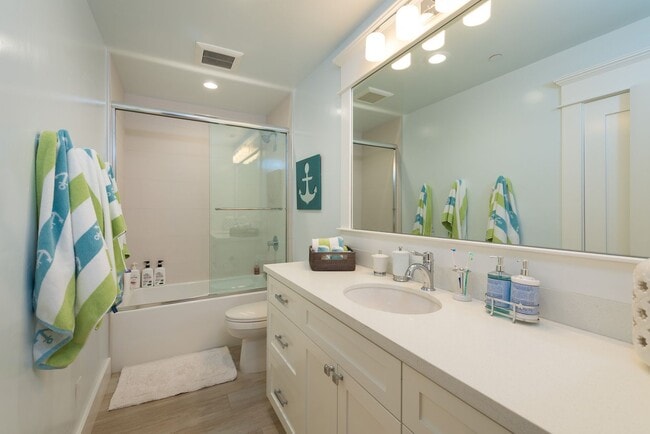 Building Photo - Four-bedroom home in the heart of the Village, offered furnished long-term lease. Ideally located...