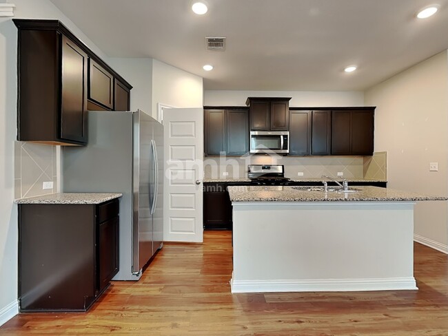 Building Photo - 8107 Cottage Rose Drive