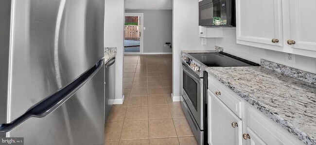 Building Photo - 6556 Pennacook Ct