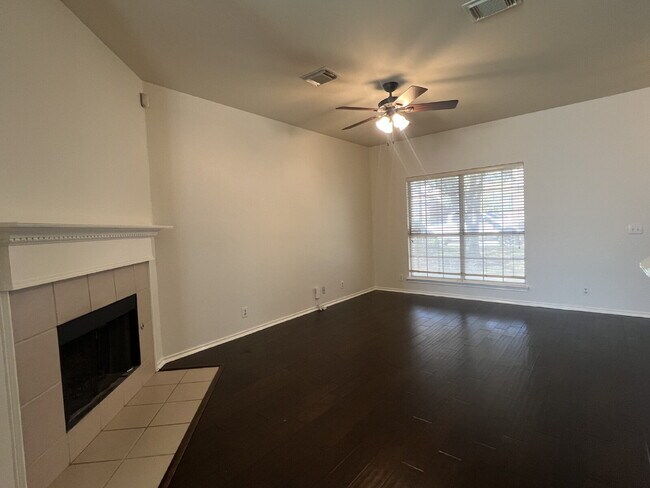 Building Photo - Charming 3-Bed /2 -Bath Sanctuary with Fireplace & Hardwood Floors, Between Evans and Bulverde at...