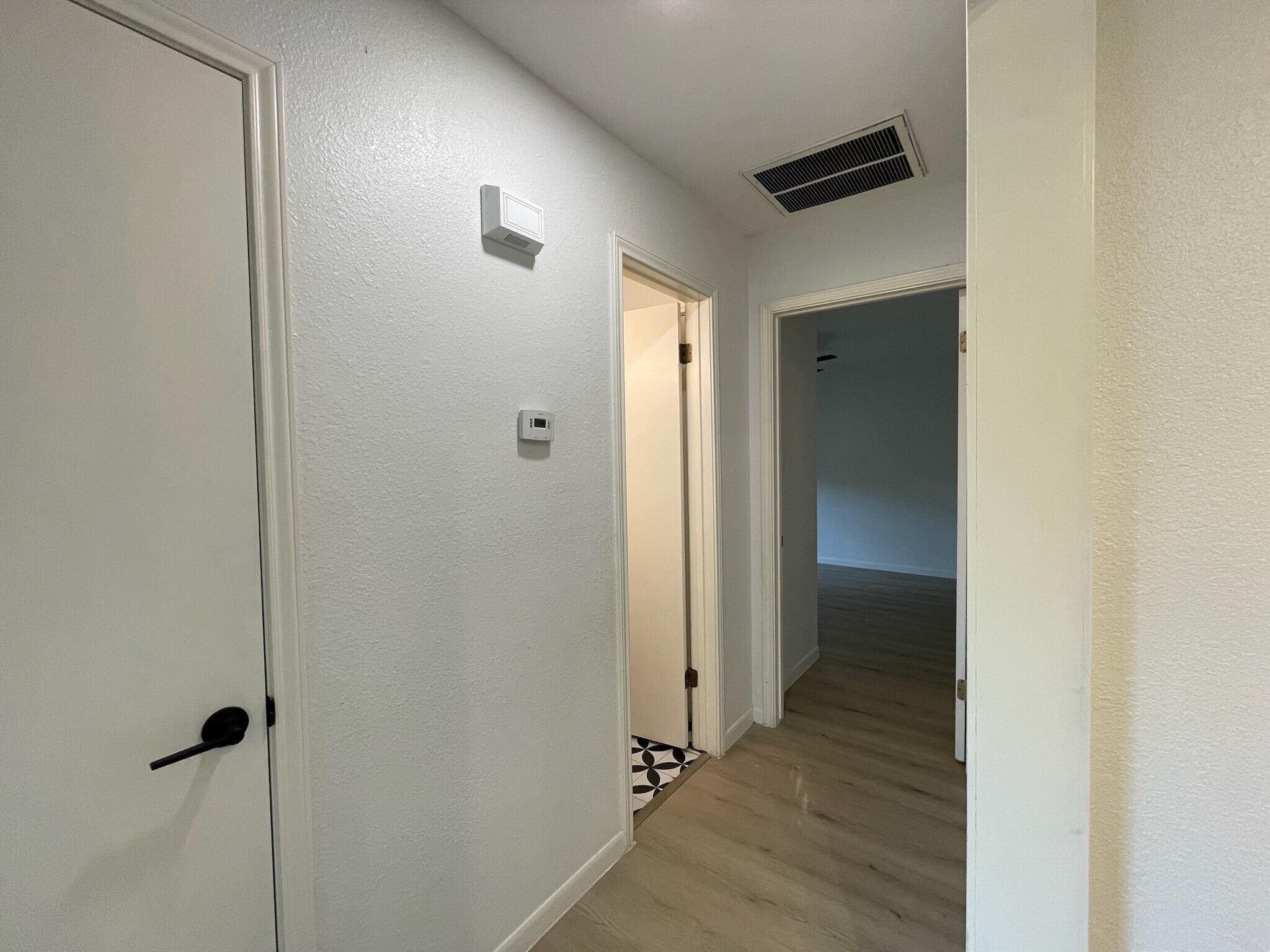 Hallway to Bedroom 2 - 2201 Pin Oak Rd