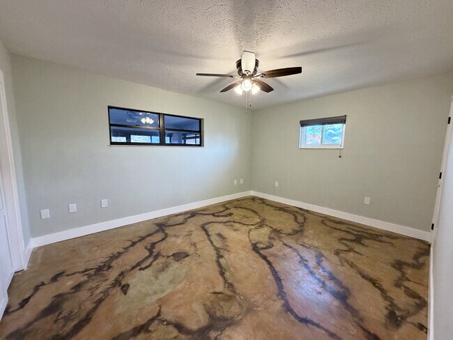 Building Photo - "Waterfront Home with Dock! 3-Bedroom Oasis with 2 Baths and 1,800 Sq Ft of Comfort in Hudson, FL!"