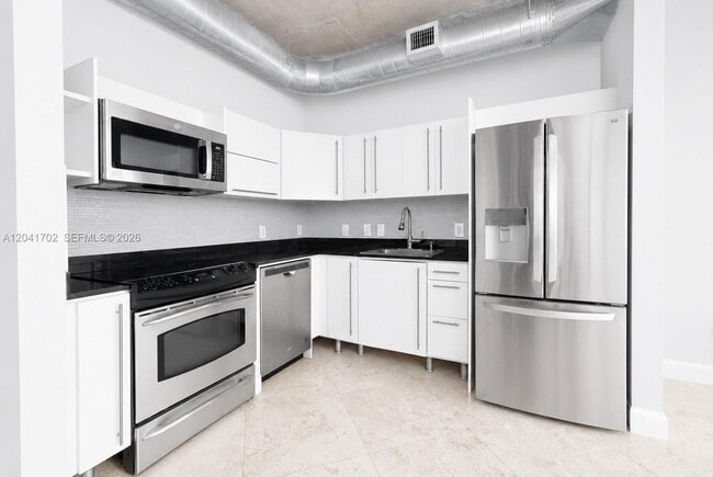 Building Photo - 690 SW 1st Ct