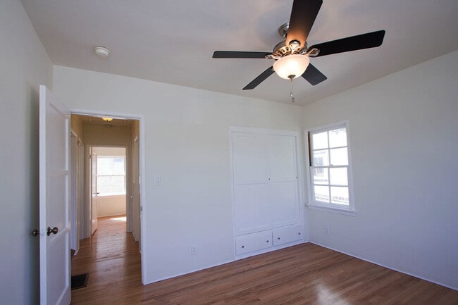 Bedroom 1 with fan - 819 E Edgeware Rd