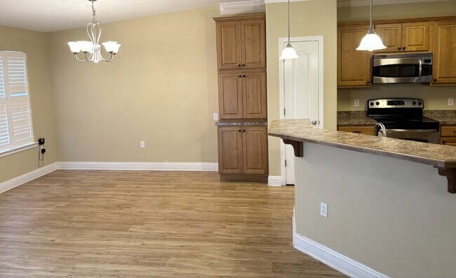 Building Photo - "Charming 4-Bed home in Navarre!"