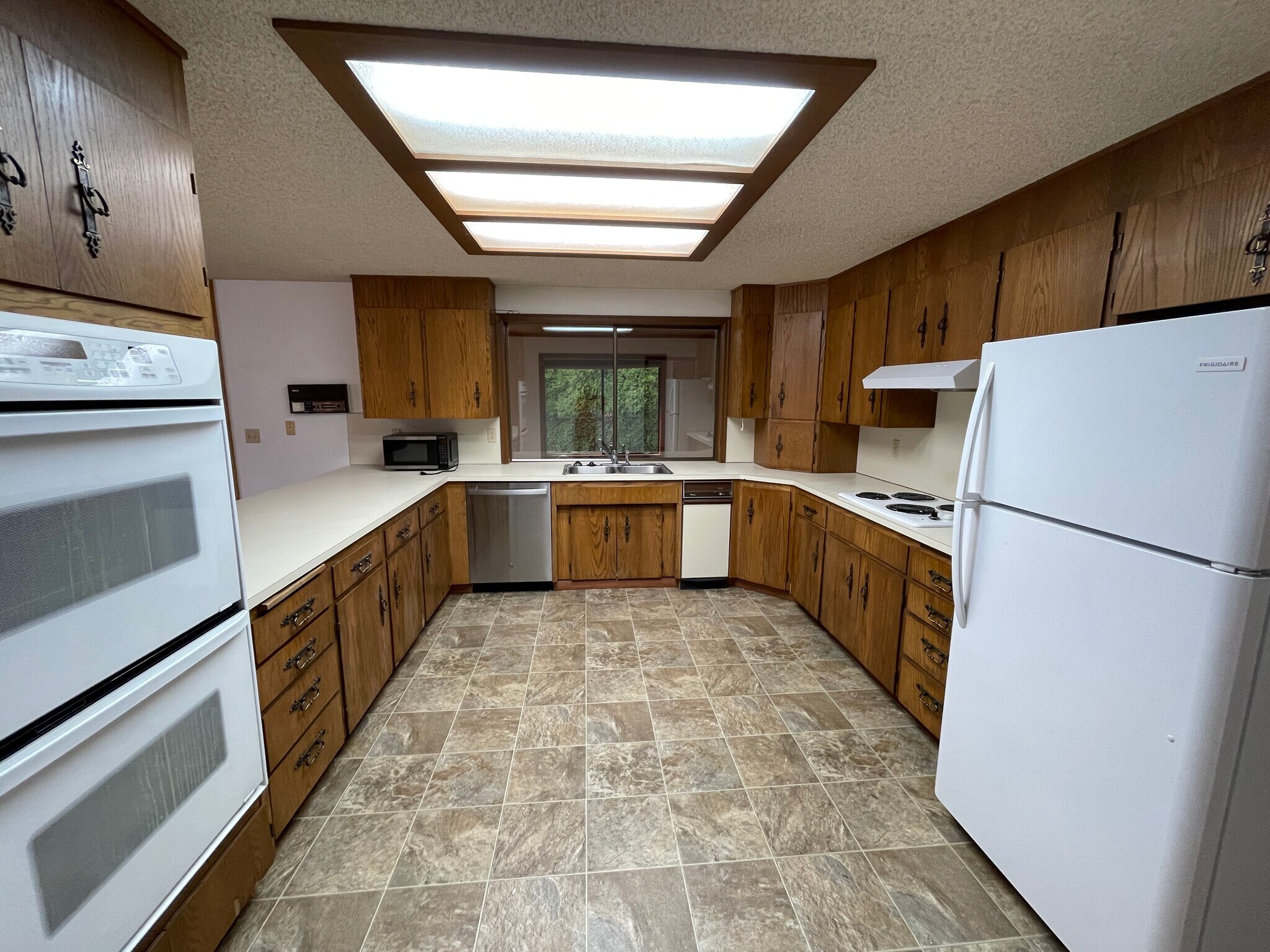 Kitchen Window view of Bonus Rm - 11923 Canyon Rd E