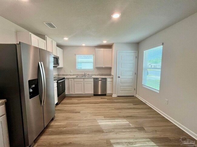 Building Photo - 6219 June Bug Dr