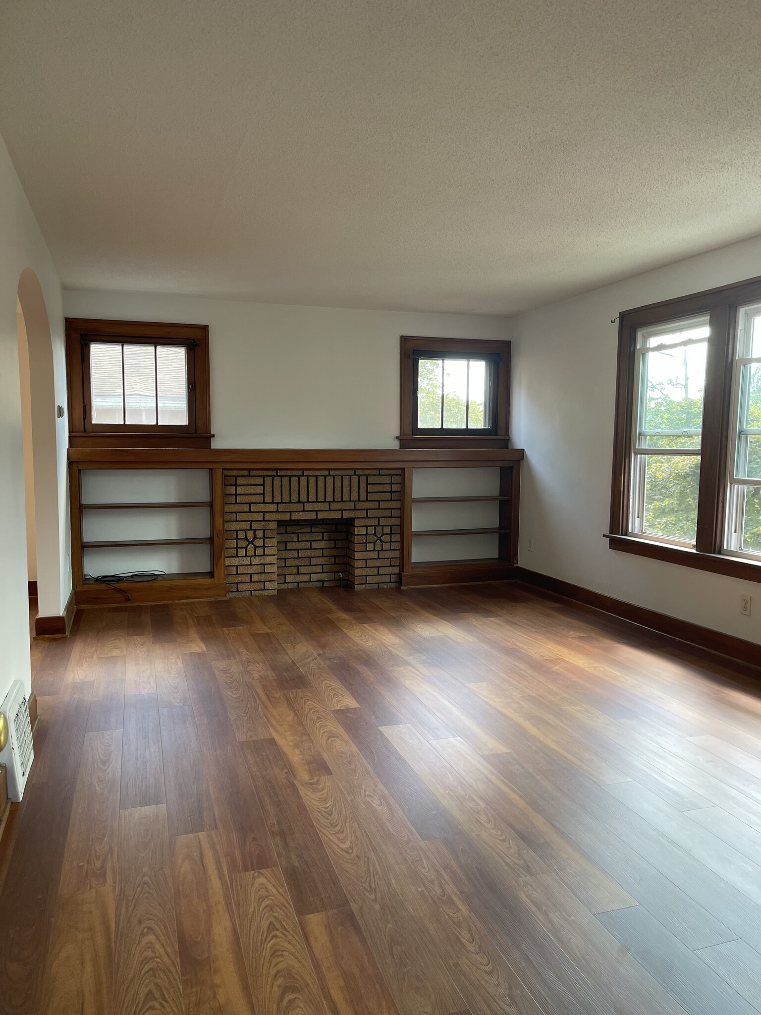 Living room 12X19 new floors freshly painted new windows - 190 Hamilton Dr